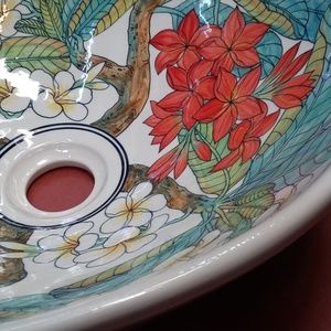 Unique hand painted porcelain wash basin.